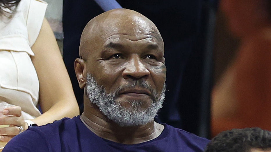NEW YORK, NEW YORK - AUGUST 29: Mike Tyson looks on during the Women's Singles First Round match between Serena Williams of the United States and Danka Kovinic of Montenegro on Day One of the 2022 US Open at USTA Billie Jean King National Tennis Center on August 29, 2022 in the Flushing neighborhood of the Queens borough of New York City. (Photo by Al Bello/Getty Images)
