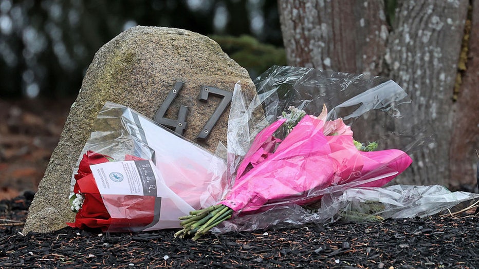 Duxbury, MA - January 25: Flowers left at 47 Summer Street. Duxbury police and fire were called to the home by a man who reported that a woman had jumped out of a window at the residence. Police discovered the bodies of two deceased children in the house. (Photo by David L. Ryan/The Boston Globe via Getty Images)