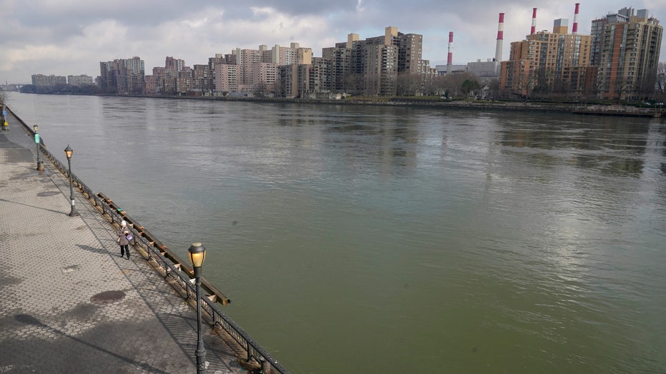 The East River viewed from the Upper East Side of the Manhattan borough of New York is seen Friday, Jan. 6, 2023. Woolly mammoth tusks were allegedly dumped in the waterway in the mid 1900s. (AP Photo/Mary Altaffer)