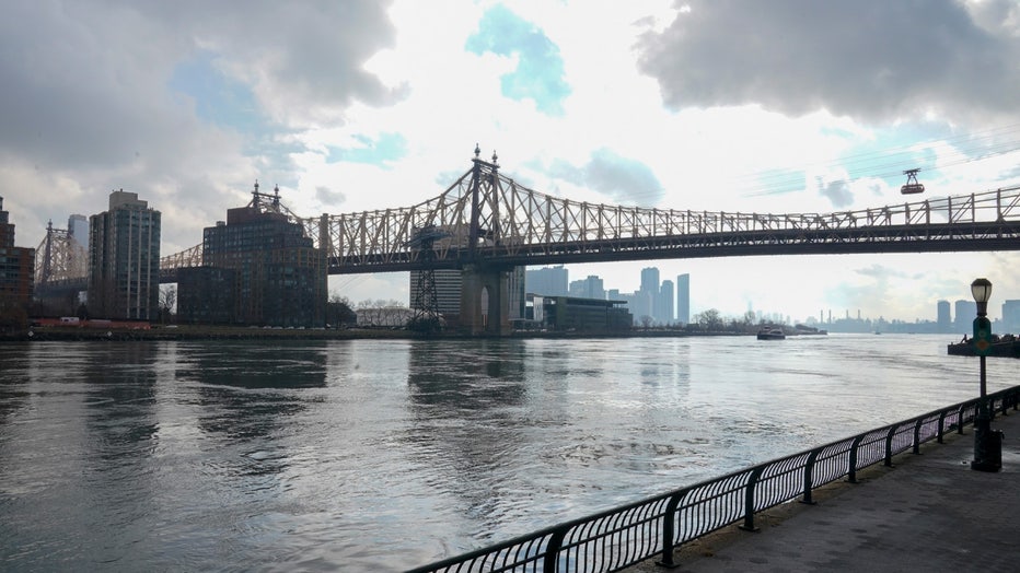 The East River viewed from the Upper East Side of the Manhattan borough of New York is seen Friday, Jan. 6, 2023. Woolly mammoth tusks were allegedly dumped in the waterway in the mid 1900s. (AP Photo/Mary Altaffer)