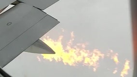 Video: Flames shoot from plane's wing as NY-bound flight makes emergency landing