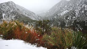 Southern California gets hit with powerful storm bringing rain, mountain snow, gusty winds