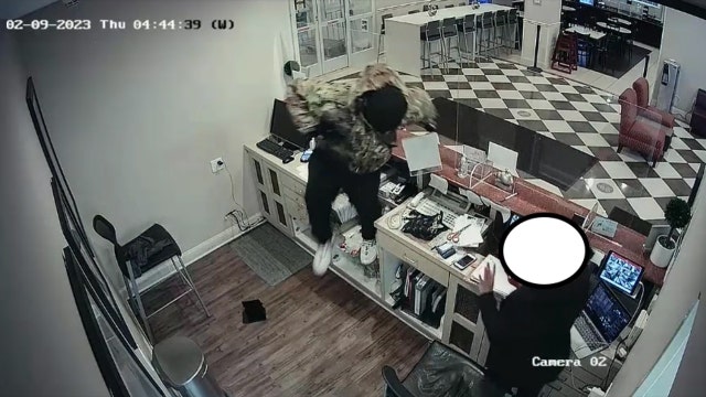 Armed man jumps counter, robs Long Island hotel