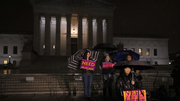 0b32f5dc-Student Loan Borrowers Gather At Supreme Court The Evening Before The Court Hears Two Cases On Student Loan Relief To State The Relief Is Legal And Needs To Happen Immediately