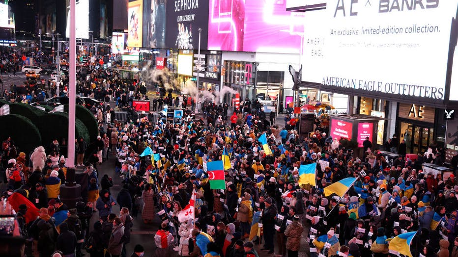 New Yorkers Commemorate One Year Of War In Ukraine In Times Square