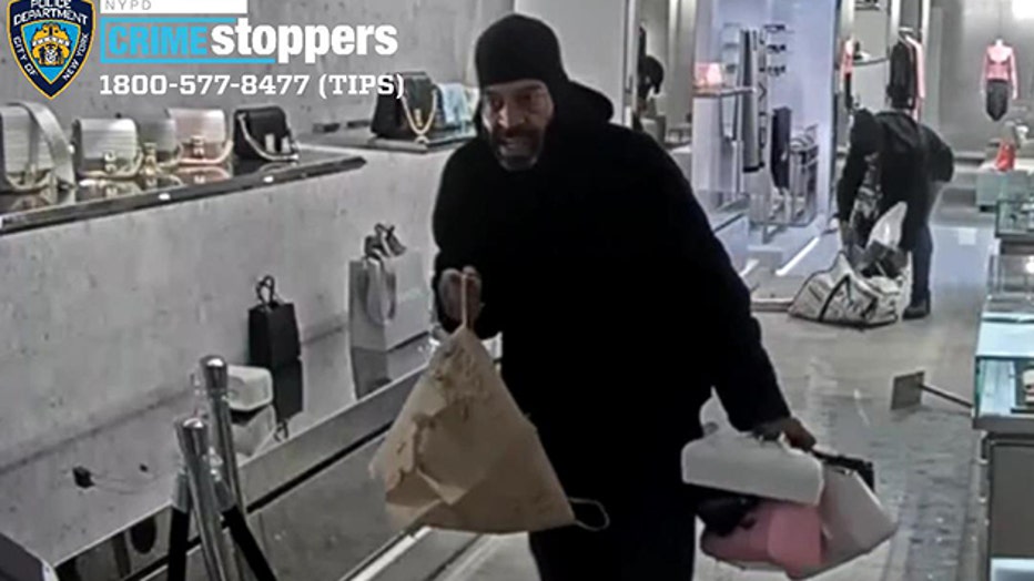 This frame of video from a security camera shows one of the Givenchy burglars.