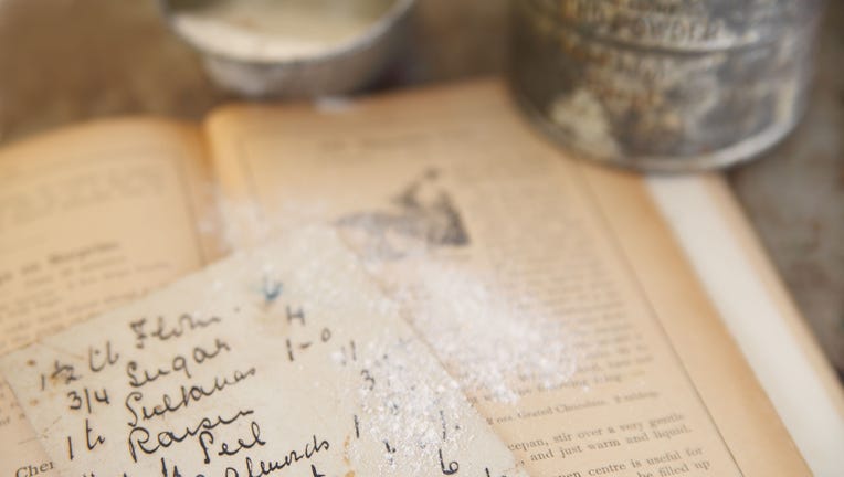 vintage cookbook with handwritten recipe