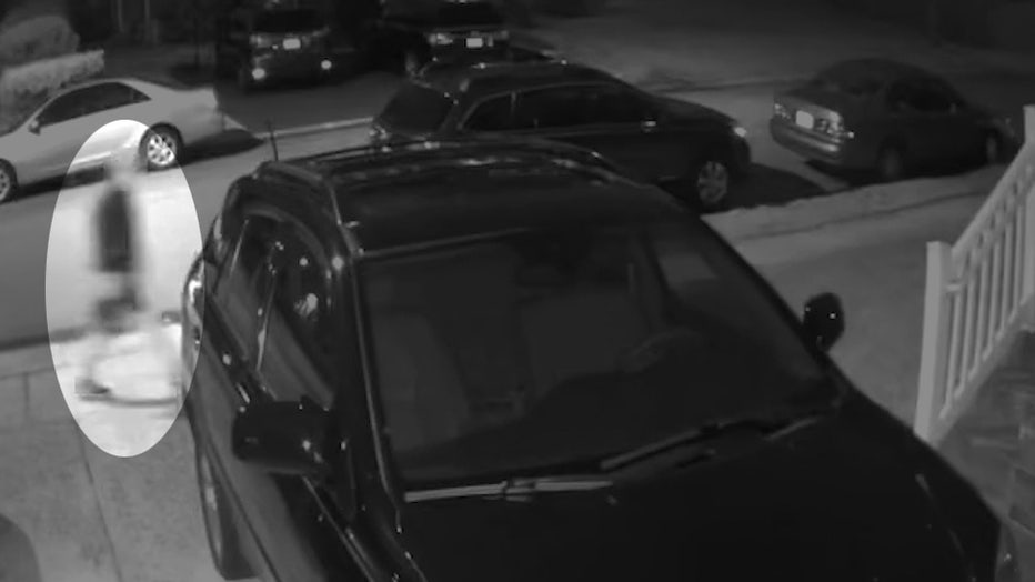 In footage shared by the Cranford Police Department, the individual is seen walking down the sidewalk and up the resident’s driveway before leaving a dead cat in the mailbox. (Credit: Cranford Police Department)