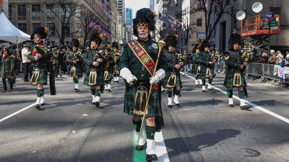 FILE - A marching band participates in the annual St. Patricks Day parade along 5th Ave. on March 17, 2018, in New York City. New Yorks Saint Patricks Day parade is the largest in the world. (Photo by Stephanie Keith/Getty Images)