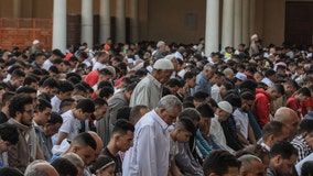 Muslims celebrate Eid al-Fitr holiday amid joy and tragedy