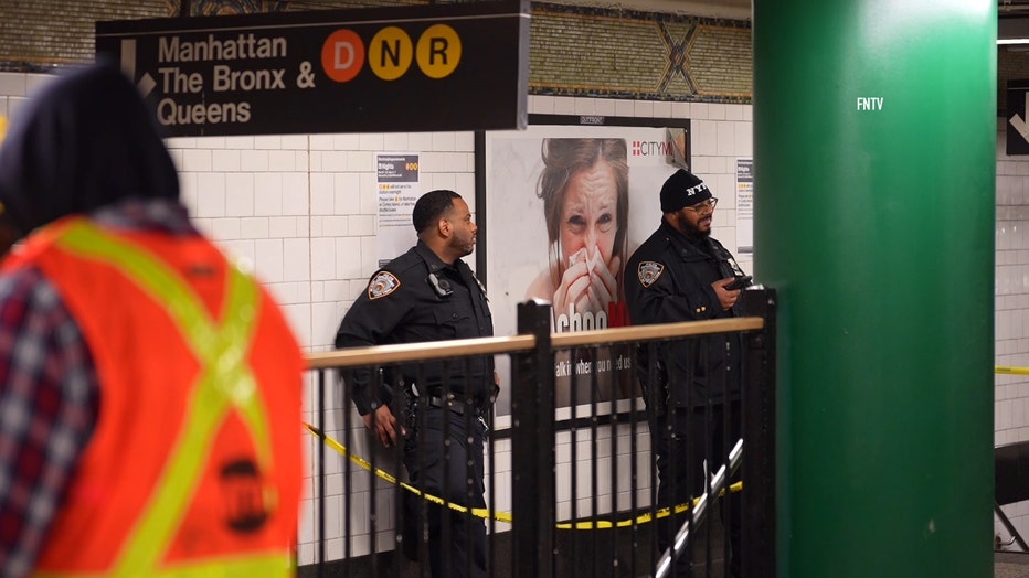 Law enforcement is pictured responding to the scene of the fatal stabbing on a Brooklyn D train, reported around 11:30 p.m. on March 6, 2023.