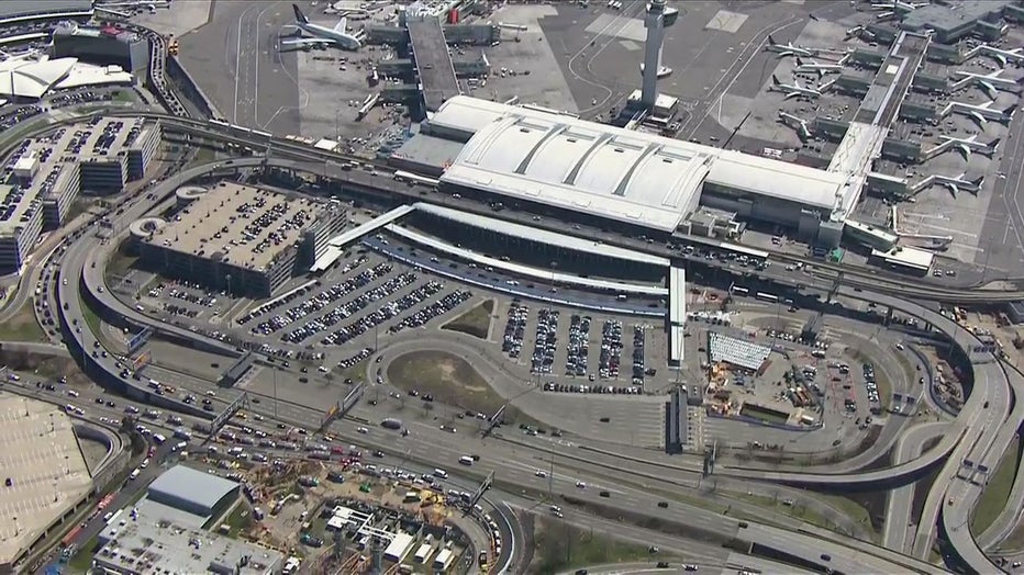 The view from SkyFOX shows a wider shot of John F. Kennedy International Airport, with the emergency response pictured in the lower left-hand corner. (Credit: FOX 5 New York)