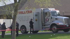 Milwaukee armored truck robbery, shootout; suspect shot, killed by guard