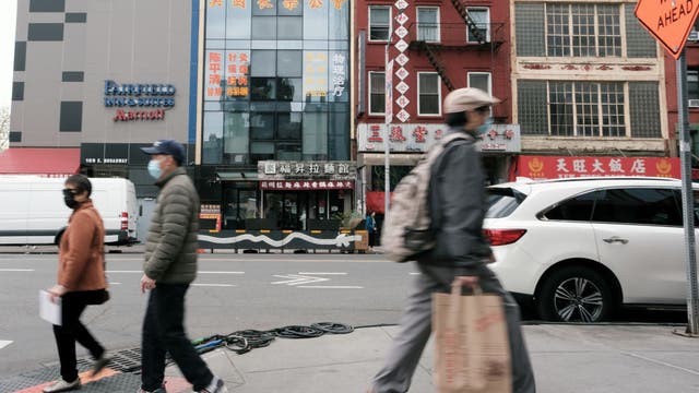 Trial opens for 3 charged with aiding Chinese campaign to harass dissidents