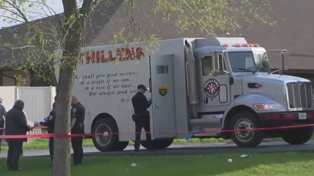 Milwaukee armored truck robbery, shootout; suspect shot, killed by guard