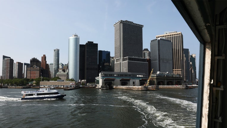 NEW YORK, NEW YORK - MAY 23: The Manhattan skyline is seen from the Staten Island Ferry on May 23, 2023 in New York City. In the new study published in the journal Earth’s Future, new research has found that New York City may be sinking due to the weight of it numerous skyscrapers. The sinking is thought to be exacerbated by the waters that flank the city, as sea levels have risen by about 9in, or 22cm, since 1950 and are believed to be a result of climate crisis. (Photo by Spencer Platt/Getty Images)