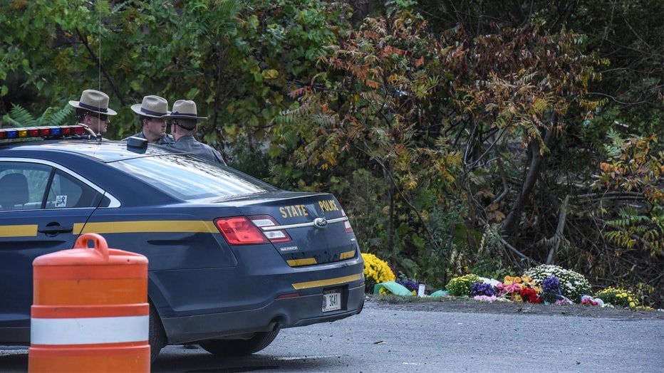 SCOHARIE, NY - OCTOBER 08: State troopers guard the site of the fatal limousine crash on October 8, 2018 in Schoharie, New York. 20 people died in the crash including the driver of the limo, 17 passengers, and two pedestrians. (Photo by Stephanie Keith/Getty Images)
