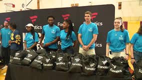 'Merch Madness': Fanatics donates hats, shirts to hundreds of Harlem students