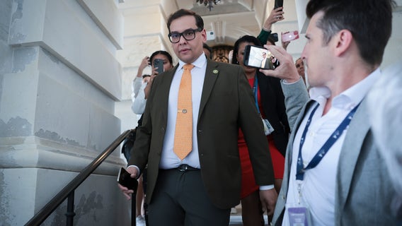 Fired George Santos aide says he got his job after sending money to Republican’s deputy