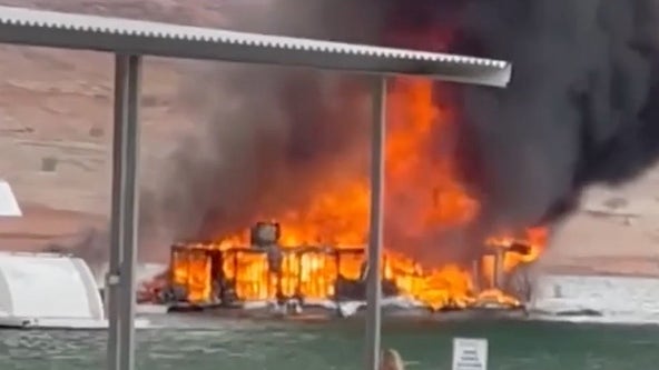 Watch: Houseboats go up in flames at marina on Arizona-Utah border