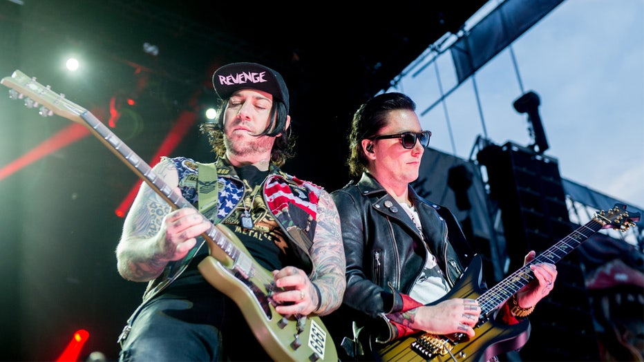 DONINGTON, ENGLAND - JUNE 08: Zachary James Baker aka Zacky Vengeance and Brian Elwin Haner Jr. aka Synyster Gates of Avenged Sevenfold perform onstage during the bands main stage headline show at Download Festival 2018 at Donington Park on June 8, 2018 in Donington, England. (Photo by Ollie Millington/Getty Images )