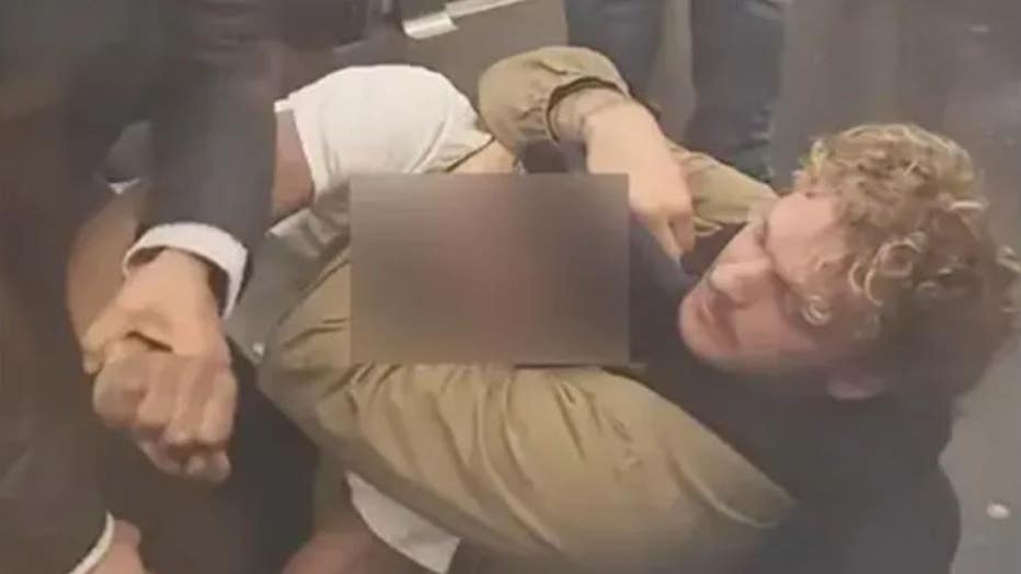 Screenshot from bystander video showing Jordan Neely being held in a chokehold on the New York City subway. (Luces de Nueva York/Juan Alberto Vazquez via Storyful)