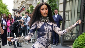 Video shows Cardi B throw mic at woman who hurled drink at her