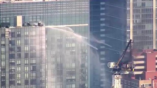 Video: Moments a construction crane collapses, catches fire in Hell's Kitchen