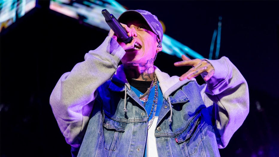DETROIT, MICHIGAN - JUNE 27: Rapper Santa Fe Klan performs during his Todo Y Nada Tour at Little Caesars Arena on June 27, 2023 in Detroit, Michigan. (Photo by Scott Legato/Getty Images)