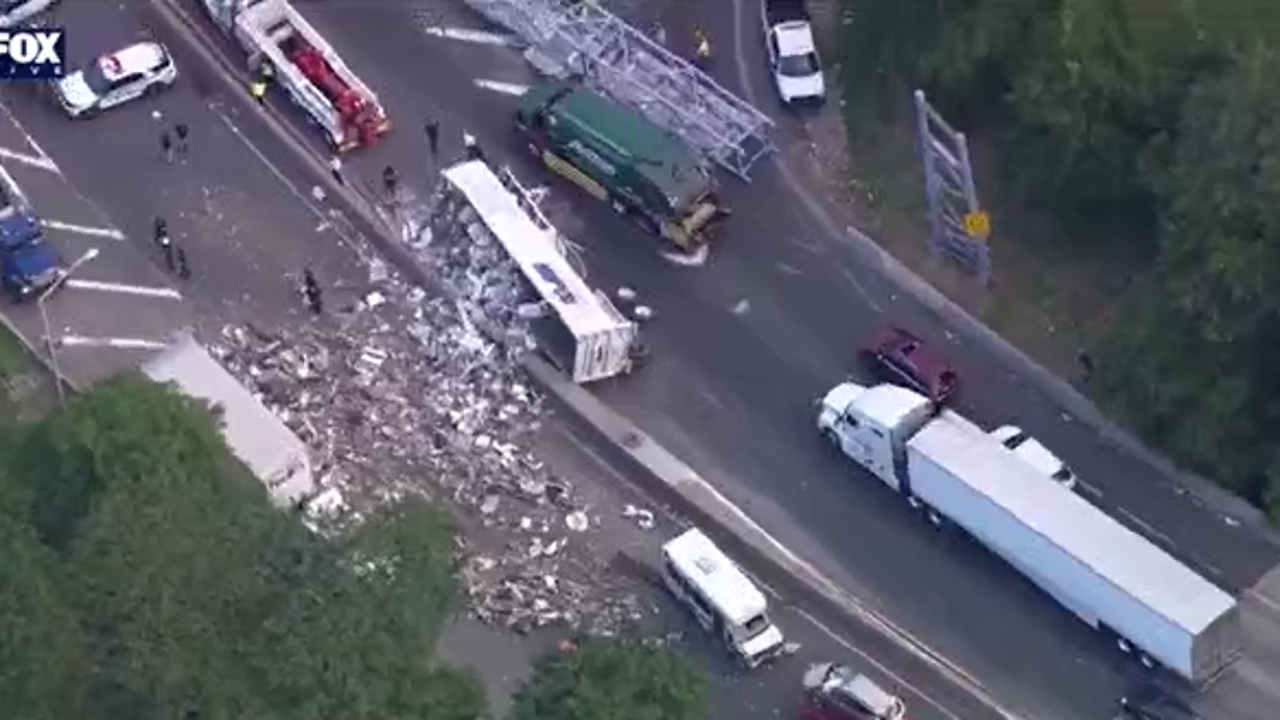 Tractor Trailer Overturns On BQE, Spills Debris, Causing Major Road ...