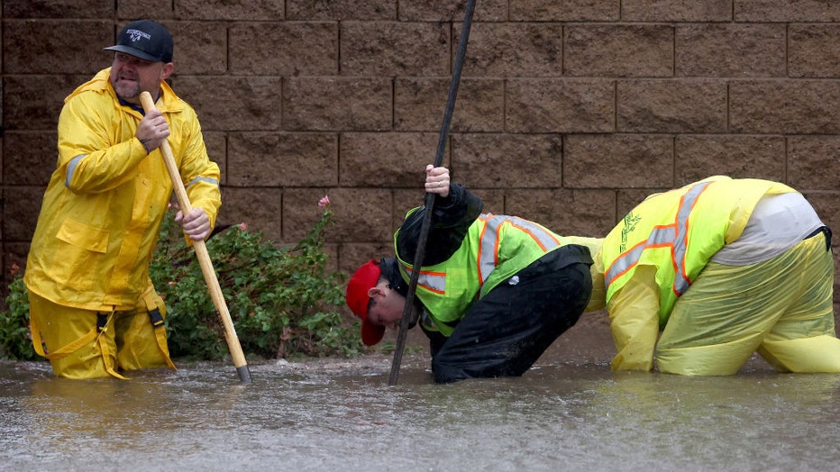 Workers-clear-storm-drains.jpg