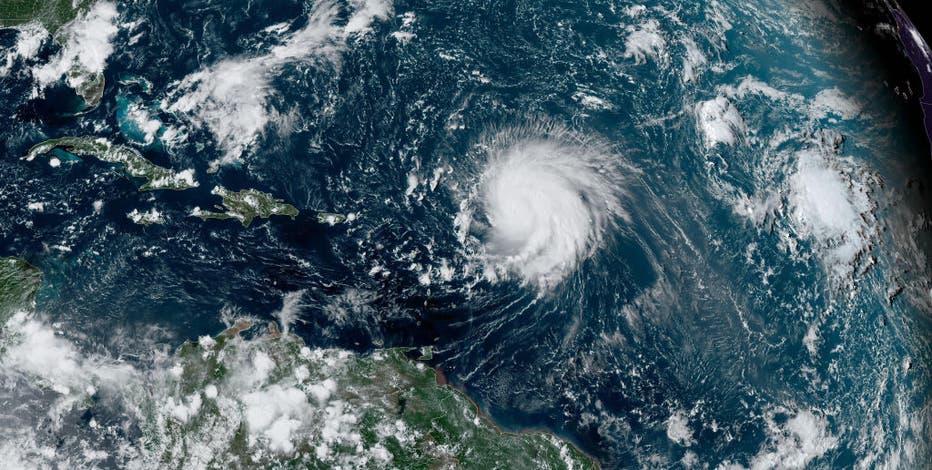 Hurricane Lee churns through Atlantic as it heads north