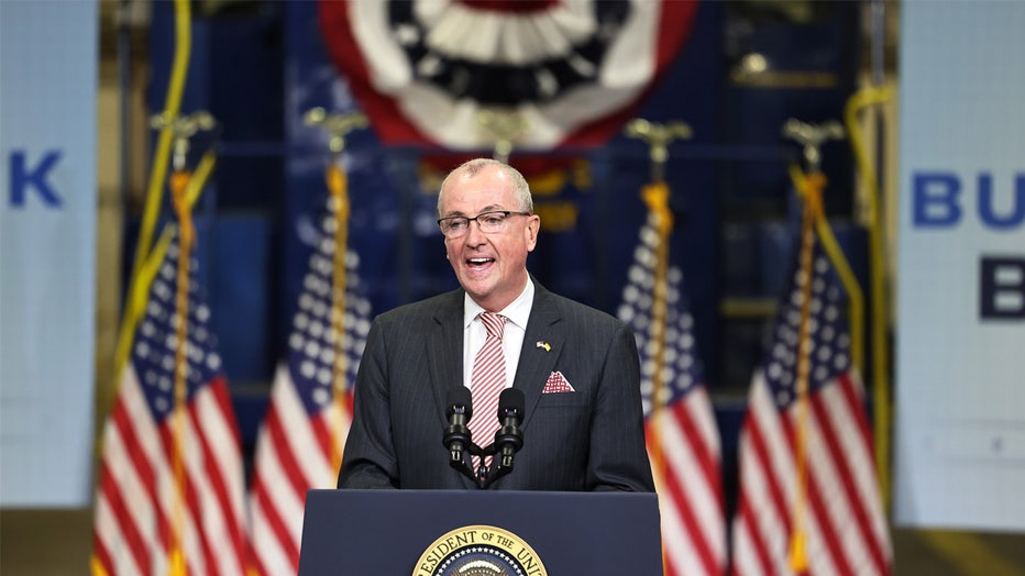 KEARNY, NEW JERSEY - OCTOBER 25: Gov. Phil Murphy speaks about President Joe Bidens Bipartisan Infrastructure Deal and Build Back Better Agenda at the NJ Transit Meadowlands Maintenance Complex on October 25, 2021 in Kearny, New Jersey. On Thursday during a CNN Town Hall, President Joe Biden announced that a deal to pass major infrastructure and social spending measures was close to being done. House Speaker Nancy Pelosi also announced on Sunday that she expects Democrats to have an "agreement" on a framework for the social safety net plan and a vote on the bipartisan infrastructure bill in the next week. The reconciliation package, which was slated at first to cost $3.5 trillion, would still be the biggest support to expanding education, health care and child care support, and also help to fight the climate crisis as well as make further investments in infrastructure. Congress still needs to pass a bipartisan infrastructure bill by October 31 before the extension of funding for surface transportation expires. (Photo by Michael M. Santiago/Getty Images)