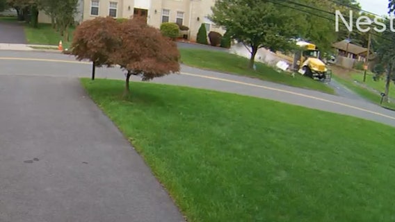 School bus with children on board crashes into Edison, New Jersey home