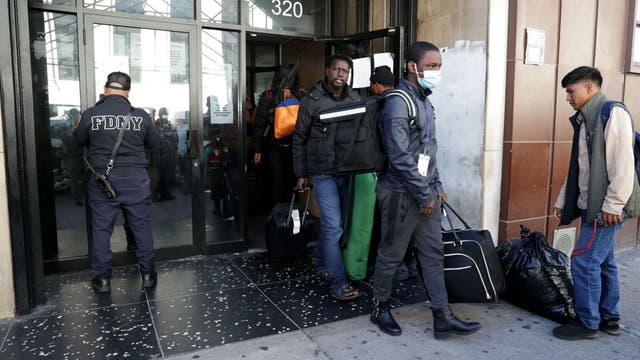 NYC officials question delays in migrant work papers