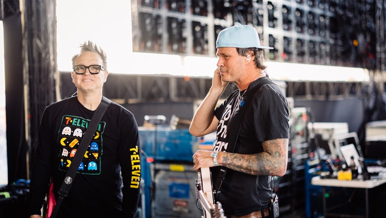 INDIO, CALIFORNIA - APRIL 14: Mark Hoppus and Tom DeLonge of Blink-182 pose backstage at the Sahara Tent during the 2023 Coachella Valley Music and Arts Festival on April 14, 2023 in Indio, California. (Photo by Matt Winkelmeyer/Getty Images for Coachella)