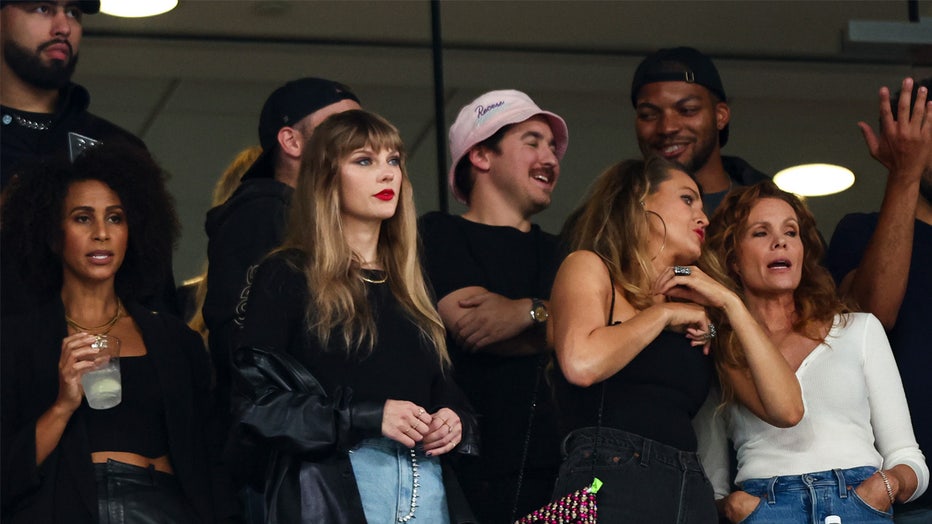 EAST RUTHERFORD, NJ - OCTOBER 1: Taylor Swift watches from the stands during an NFL football game between the New York Jets and the Kansas City Chiefs at MetLife Stadium on October 1, 2023 in East Rutherford, New Jersey. (Photo by Kevin Sabitus/Getty Images)