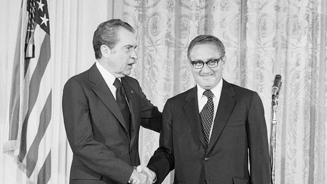 Global leaders pay tribute to Henry Kissinger, while record also draws criticism