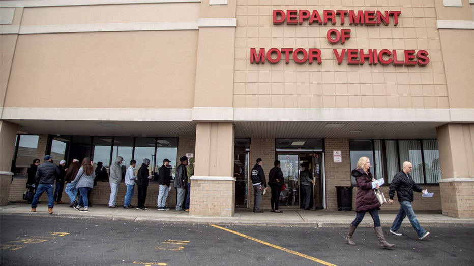 Medford, N.Y.: People line up waiting outside of the New York State Department of Motor Vehicles office in Medford, New York on Long Island on Jan. 31, 2020. Long lines have resulted from the Green Light Law which allows immigrants in the country illegally to obtain drivers licenses. (Photo by Yeong-Ung Yang/Newsday via Getty Images)