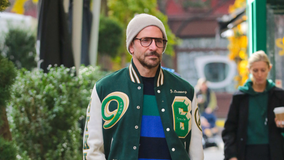 Bradley Cooper slings cheesesteaks in NYC