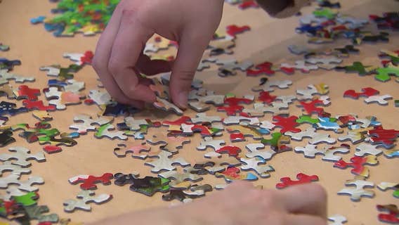 NYC puzzle enthusiasts gather for jigsaws and a new way to socialize