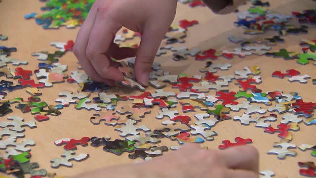 NYC puzzle enthusiasts gather for jigsaws and a new way to socialize