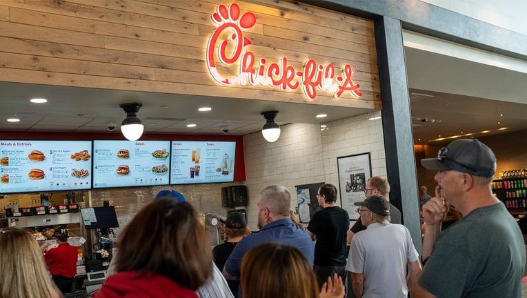 PLATTEKILL, NEW YORK - JUNE 15: Customers stand in line to order food at a Chick-fil-A restaurant June 15, 2023 along I-87 interstate in Platekill, New York. (Photo by Robert Nickelsberg/Getty Images)