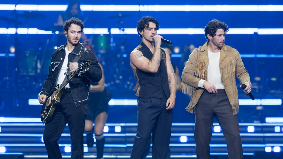 VANCOUVER, BRITISH COLUMBIA - NOVEMBER 11: (L-R) Kevin Jonas, Joe Jonas and Nick Jonas of Jonas Brothers perform on stage during their 'Five Albums. One Night. The World Tour' at Rogers Arena on November 11, 2023 in Vancouver, British Columbia, Canada. (Photo by Andrew Chin/Getty Images)