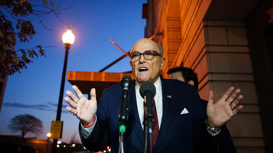 WASHINGTON, DC - DECEMBER 11: Rudy Giuliani, the former personal lawyer for former U.S. President Donald Trump, speaks to the press as he leaves the E. Barrett Prettyman U.S. District Courthouse on December 11, 2023 in Washington, DC. Jury selection and opening arguments started today in his defamation jury trial brought by Fulton County election workers Ruby Freeman and Shane Moss, who successfully sued Giuliani in civil court. (Photo by Drew Angerer/Getty Images)