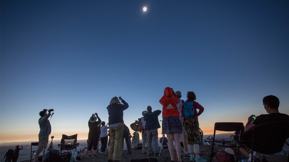 MENAN, ID - AUGUST 21: Locals and travelers from around the world gather on Menan Butte to watch the eclipse on August 21, 2017 in Menan, Idaho. Millions of people have flocked to areas of the U.S. that are in the "path of totality" in order to experience a total solar eclipse. (Photo by Natalie Behring/Getty Images)