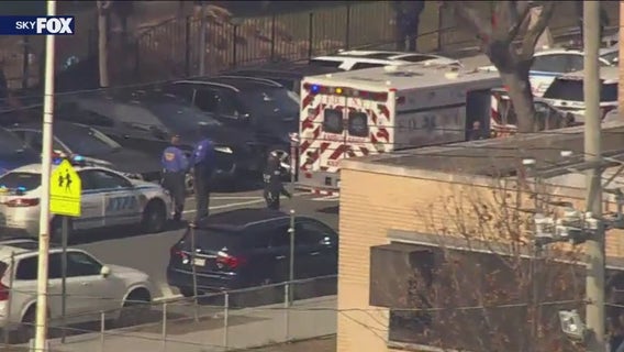 Man shot by police in Queens after pointing gun at cop's head