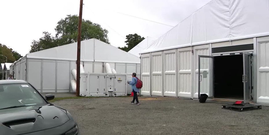 NYC migrant shelter housing single men could add more, despite local resident protests