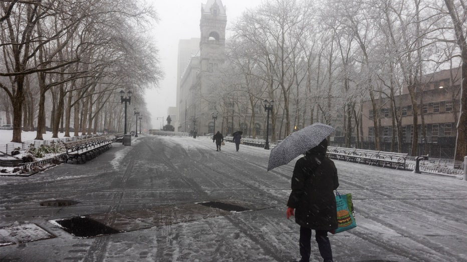 NEW YORK, NEW YORK - FEBRUARY 13: An increasingly rare snow storm descends over New York City during the morning commute, February 13, 2023, in Brooklyn, New York. In anticipation of the storm, Mayor Eric Adams announced that schools would be going fully remote today. (Photo by Andrew Lichtenstein/Corbis via Getty Images)