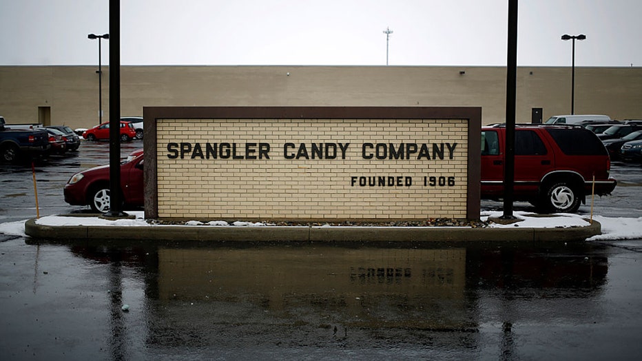 FILE - Spangler Candy Co. signage stands outside the company's production facility in Bryan, Ohio, U.S., on Tuesday, March 3, 2015. Photographer: Luke Sharrett/Bloomberg via Getty Images